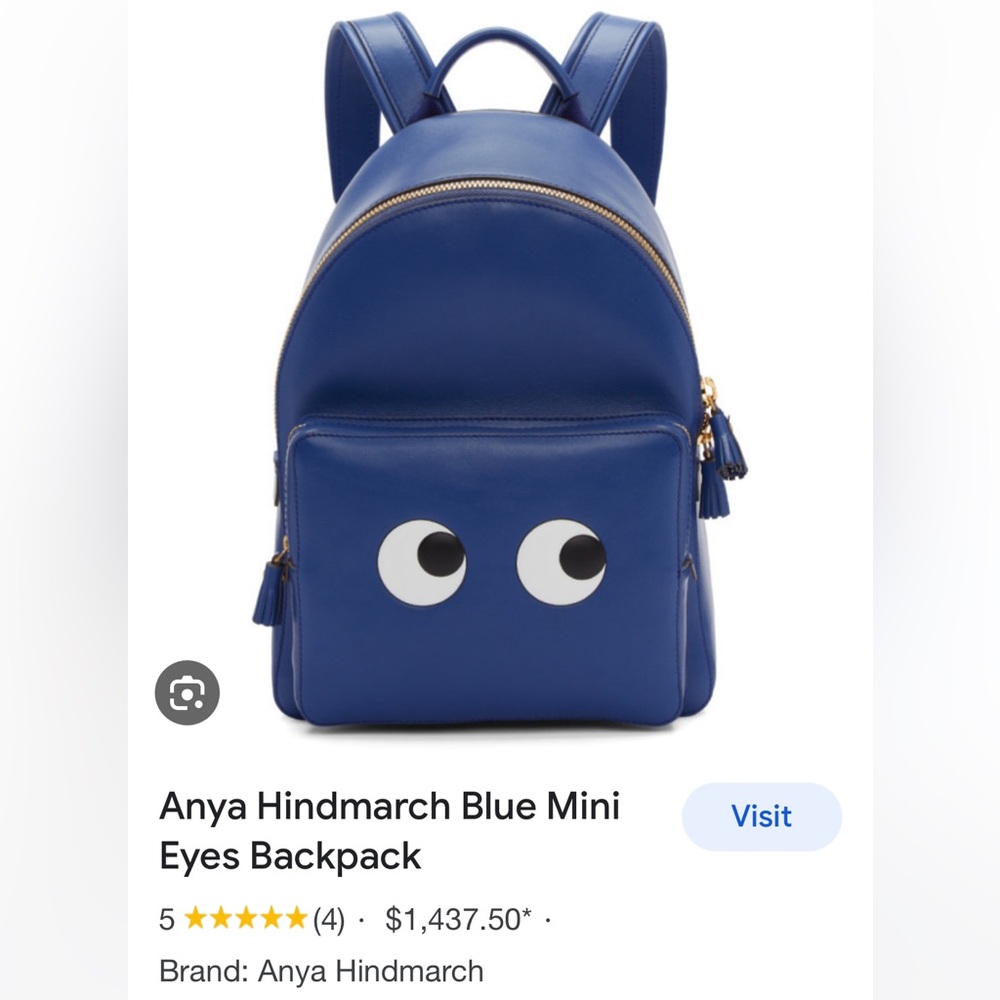 Anya Hindmarch Mini Backpack in color Blueberry Blue.